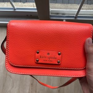 Kate Spade cross body bag - gently used in a neon corral color